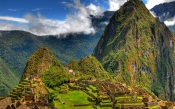 Huayna Picchu towers above the ruins of Machu Picchu, Urubamba Valley in Peru