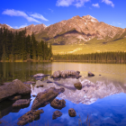 Reflections in the Lake: the Mountains, the Forest, the Blue Sky