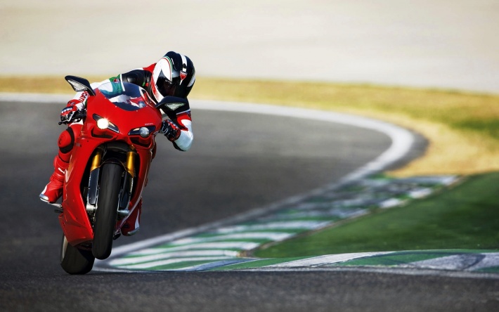 Motorcyclist On The Rear Wheel