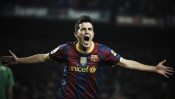 David Villa celebrates his goal against Real Madrid