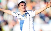 Robbie Keane double leads