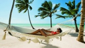 Girl in a Hammock on the Beach