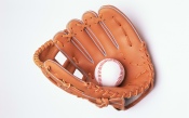 Glove and Ball for a Game of Baseball