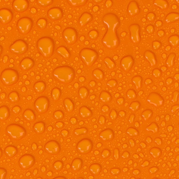Water Drop on Orange Background