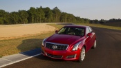 Red Cadillac ATS 2013 on the Highway