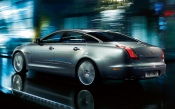 Silver Jaguar XJ in Motion