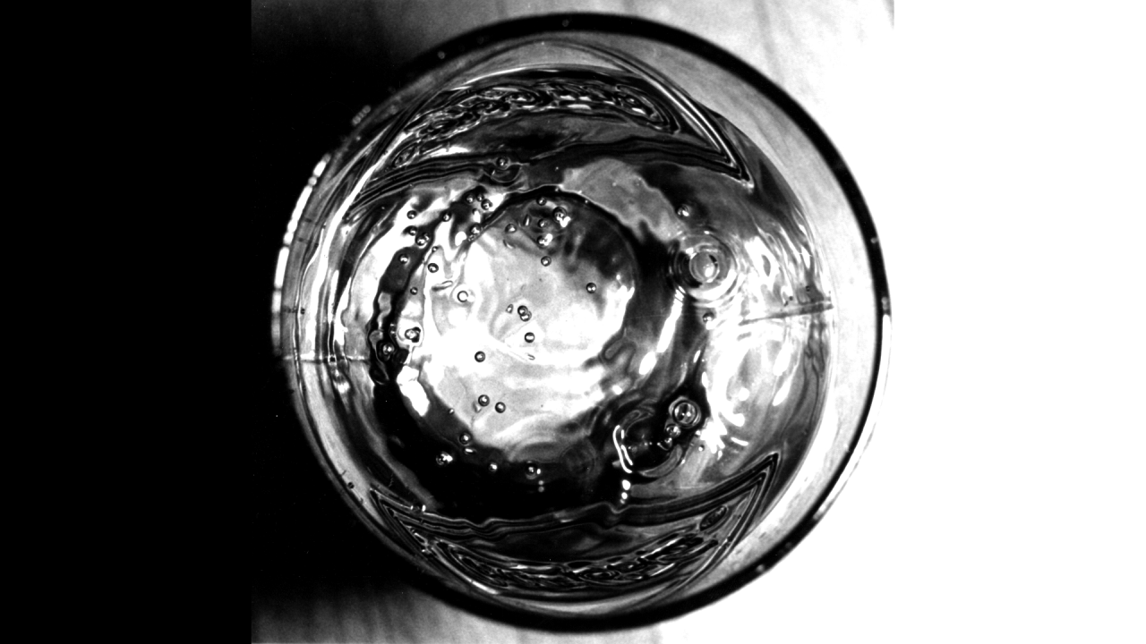 Black and white glass of  water