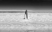Space Shuttle Breaching Clouds